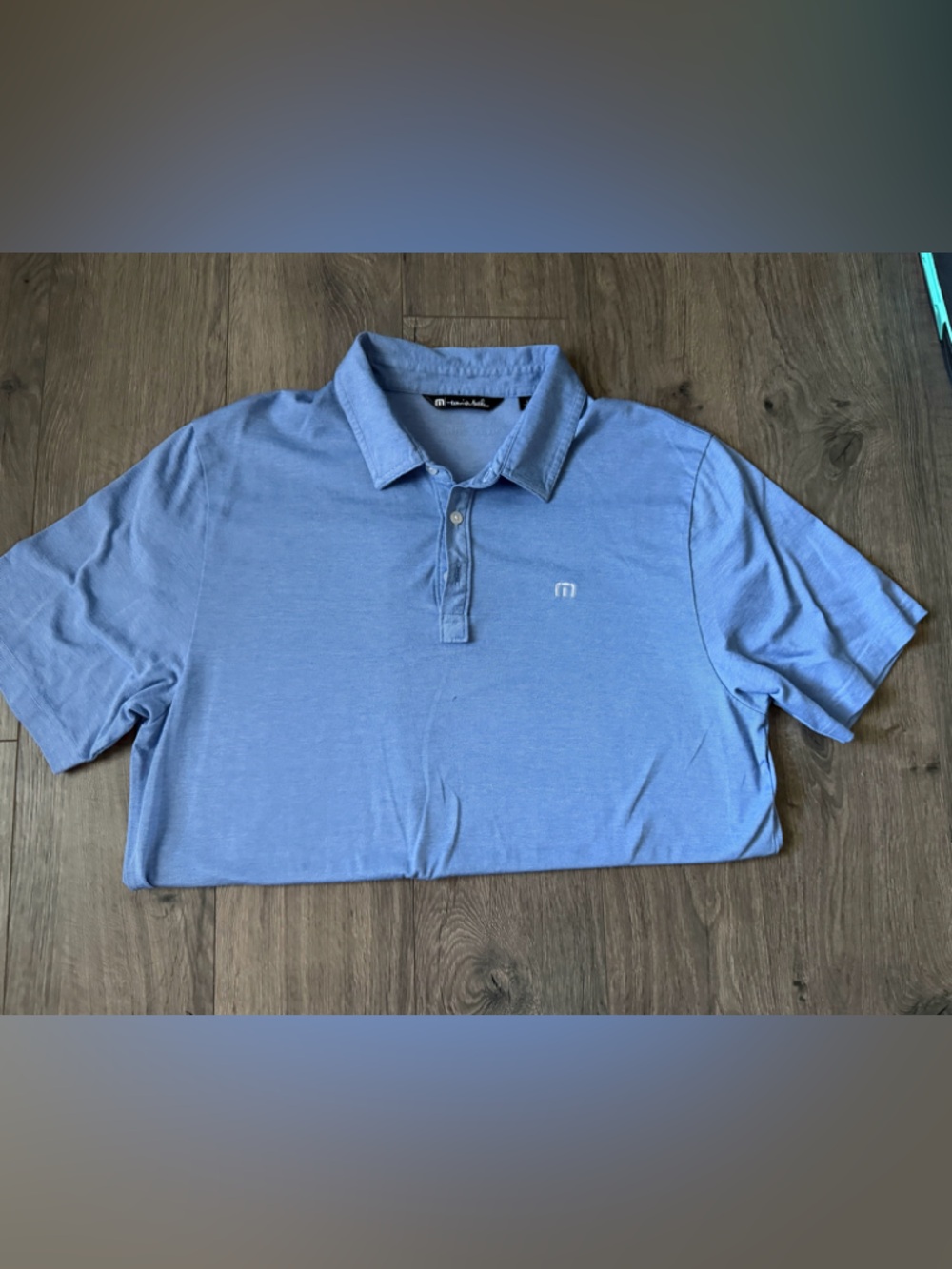 TravisMathew Light Blue Polo Shirt